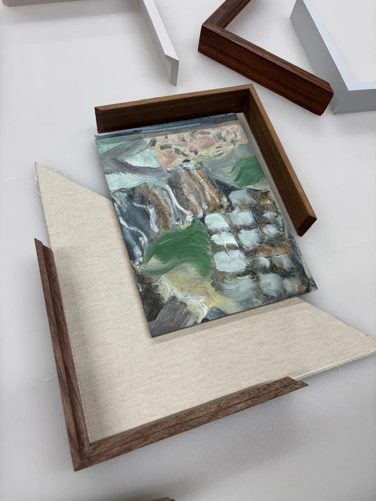 Artwork being prepared with bespoke framing materials
